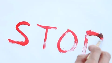 Human hand writing word "stop" Video stock 40031902