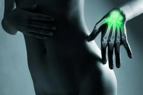 Human hand in x-ray, on gray background Stock Photos