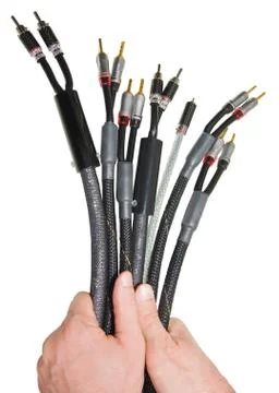 Human hands with audio video by cables Stock Photos