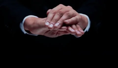 Human hands on black background Stock Photos