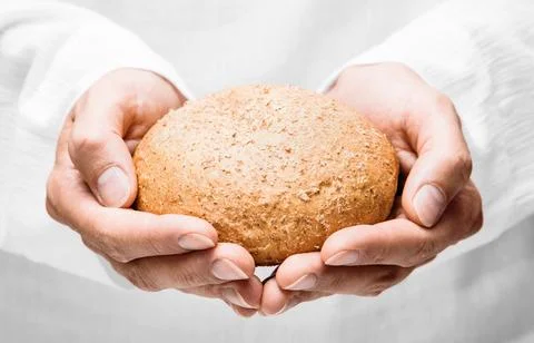 Human hands with bread Stock Photos