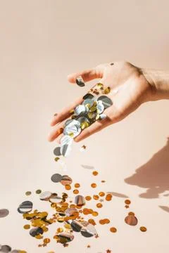 Human hands with confetti Stock Photos