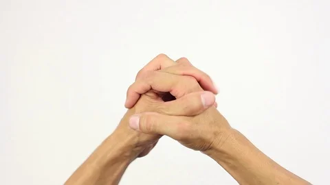 Human hands connected in lock, then splits and removed, white background Stock-Footage 93780604