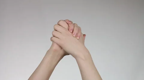 Human hands demonstrating a gesture of a victory. Stock Footage 60405498