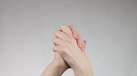 Human hands demonstrating a gesture of a victory. Video stock 60405577