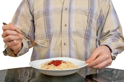 Human hands with fork and spaghetti Foto stock