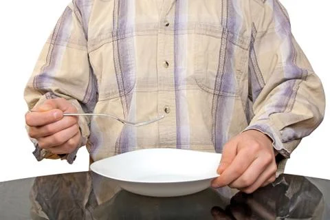 Human hands with fork and white plate Stock Photos