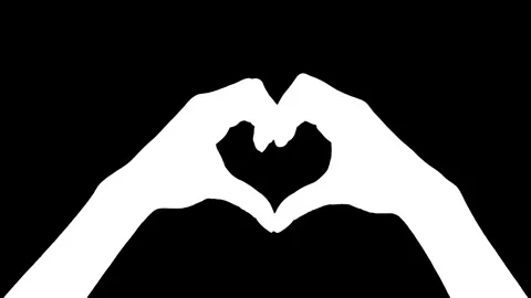 Human hands making heart gesture with fingers on black background. Stock Footage 335694317