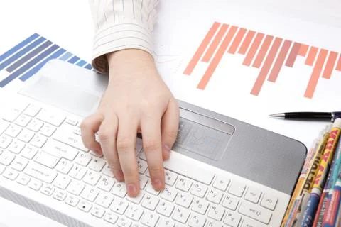 Human hands on the notebook keyboard Stock Photos