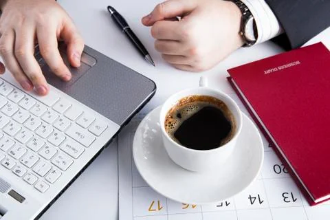 Human hands on the notebook keyboard Stock Photos