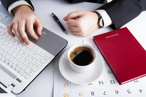 Human hands on the notebook keyboard Stock Photos