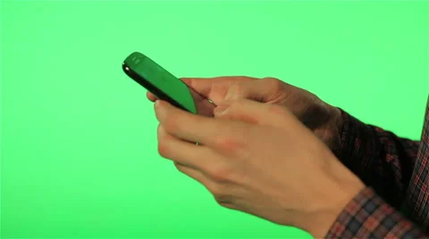 Human hands with the phone on green screen Stock Footage 61516232