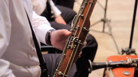 Human hands playing a clarinet closeup Stock Footage 127128294