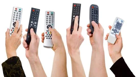 Human hands from a remote control Stock Photos