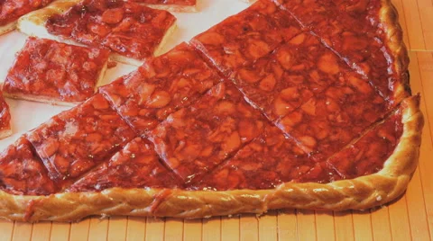 Human hands take to pieces of the strawberry pie Stock Footage 64408339