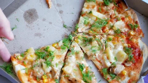 Human hands take slices of hot tasty italian pizza from open box, party food Stock-Footage 336586777