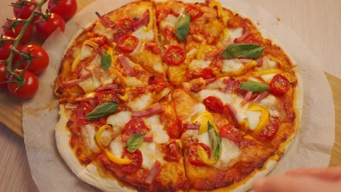 Human hands taking pieces slices of hot tasty italian pizza from open box, food Stock Footage 121834504