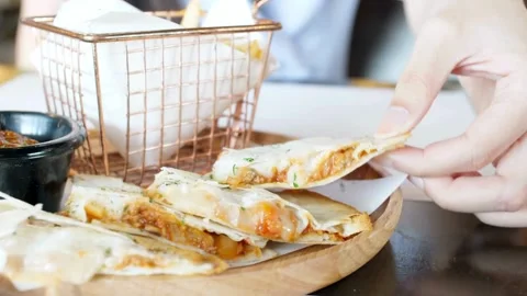 Human hands taking pieces slices of hot tasty italian pizza from open box, food 스톡 동영상 336586654