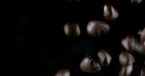 Human hands to touch high-quality coffee beans to scatter, bag jute, slow motion Stock Footage 104624344