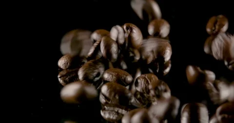 Human hands to touch high-quality coffee beans to scatter, bag jute, slow motion Stock Footage 104624609