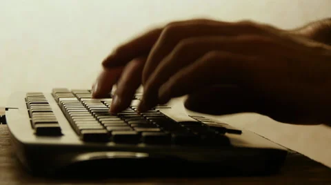A human hands typing on a keyboard Stock Footage 61790535