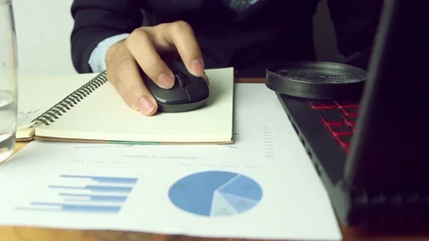 Human hands using a computer mouse on a desk, a businessman working Stock Footage 91074382
