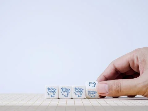 The human head symbol changing, flipping to AI or artificial intelligence ico Stock Photos