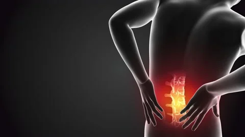 Human holding back due to back pain Stock Footage 168922155