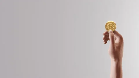 Human Holding Bitcoin on White Background 库存影片 169241861