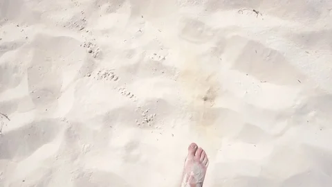Human legs, walking on the white sand beaches of the Caribbean coast Stock Footage 71156439