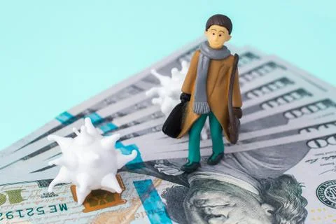Human model and virus on dollars. Epidemic pandemic coronavirus 2019-ncov Stock Photos