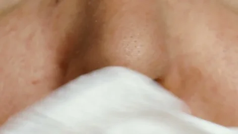 Human nose sniffs Stock Footage 80856846