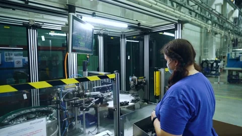 Human participation in the work of the machine in production Stock Footage 164062920