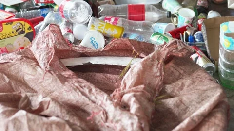 Human plastic dumping, eco-friendly environment, empty containers Video stock 306034895