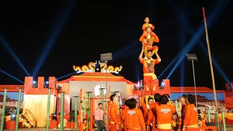 Human pyramid performance during Chinese Lunar New Year celebration Stock-Footage 106985229