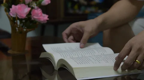 Human reading a book Stock Footage 39715660