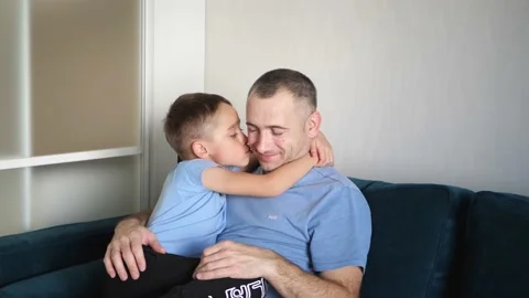 Human relations. Father and son hug each other. The concept of a happy family Video stock 166460598
