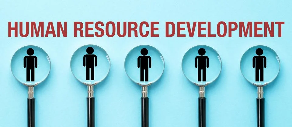 HUMAN RESOURCE DEVELOPMENT text with five magnifying glasses focusing on hu.. Stock Photos