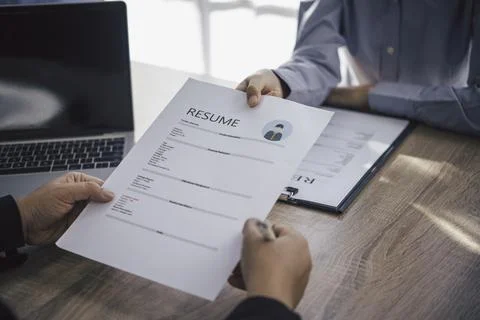 Human resource manager Is explaining the job to the job seeker before filling Stock Photos