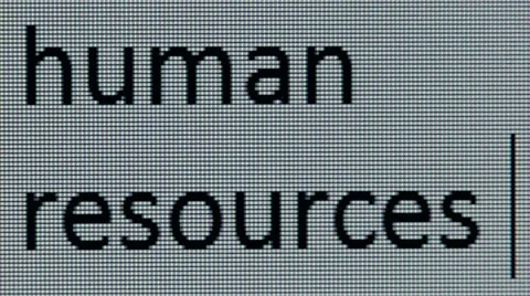 "human resources" being typed on a computer screen in close up Stock Footage 54258361