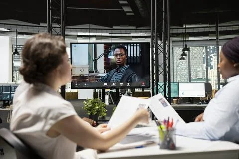 Human resources group conduct virtual call interview with applicant via internet Stock Photos