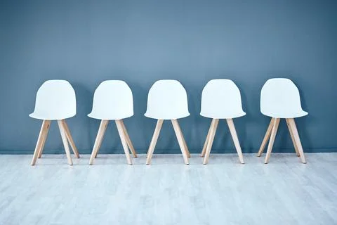 Human resources, hiring and recruitment with a row of chairs in a studio on a Stock Photos