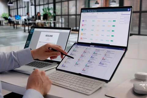 Human Resources Manager Analyzing Staffing Software Data On Laptop In Corpora Stock Photos