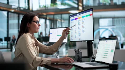 Human Resources Manager Carefully Reviewing Candidate Profiles Stock Footage 339906495