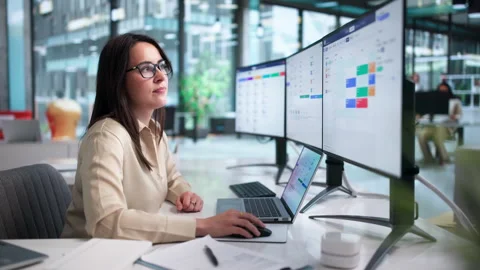 Human Resources Manager Carefully Reviews Candidate Notes During Laptop Stock Footage 337638565