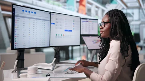 Human Resources Manager Carefully Reviews Payroll Software Vídeo Stock 342979738