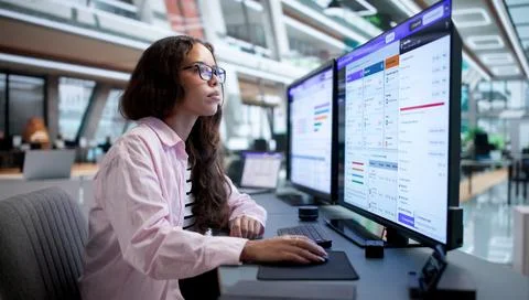 Human Resources Manager Efficiently Using Digital Enrollment Software On Comp Stock Photos