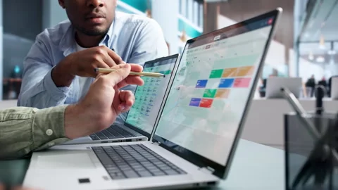 Human Resources Manager Reviews Candidate Resume While Scheduling Interviews Stock Footage 345312506