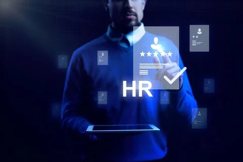 Human resources professional uses digital tools for employee evaluation and Stock Photos