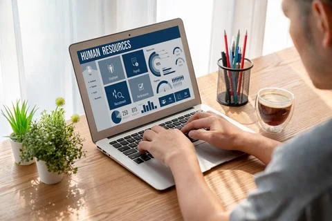 Human resources software on computer screen help employee manage people snugly Stock Photos